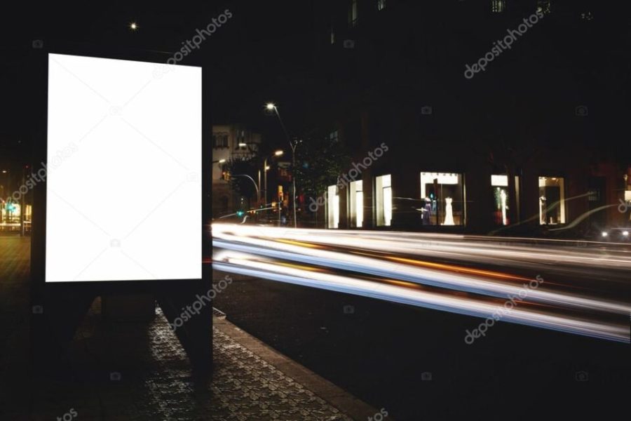 Blank billboard with night city on background