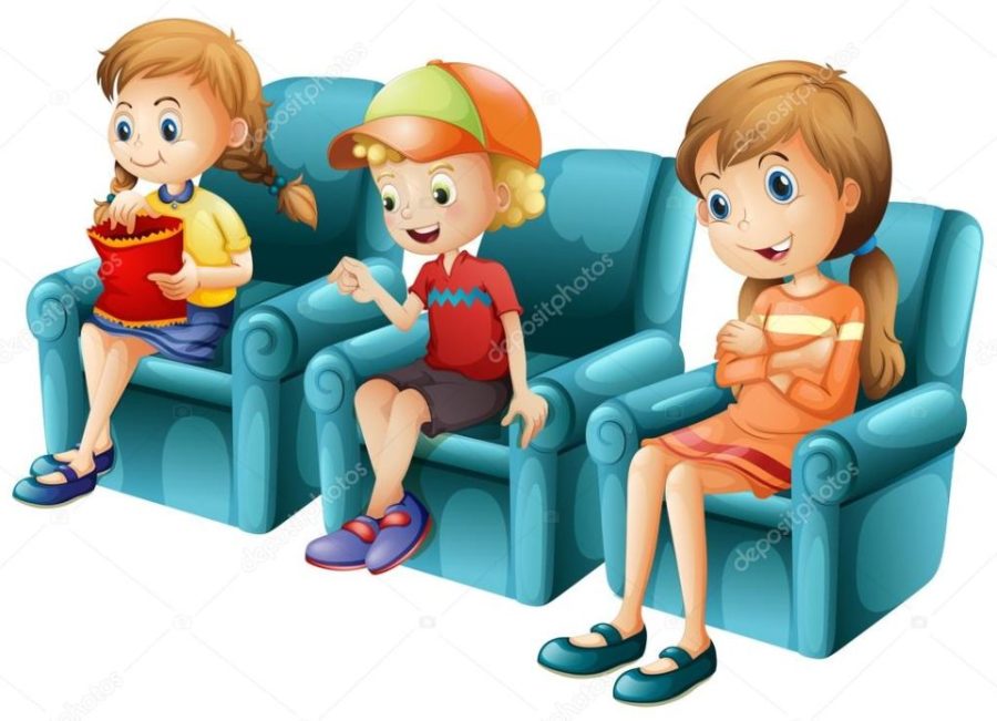 Children sitting on blue sofa