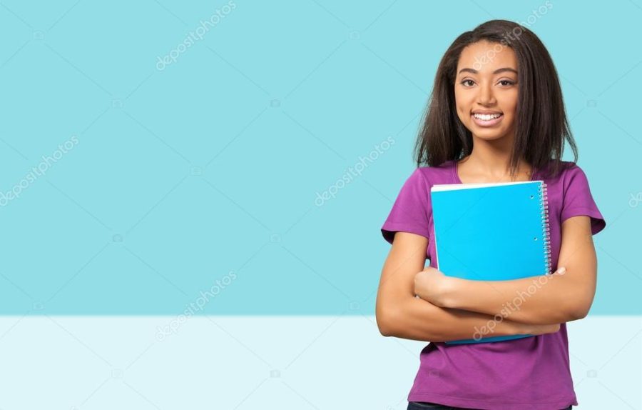 Afro American female student with book
