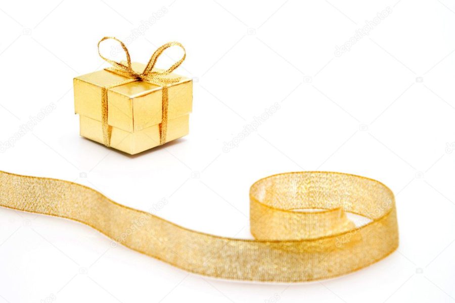 Gold gift box with the ribbon