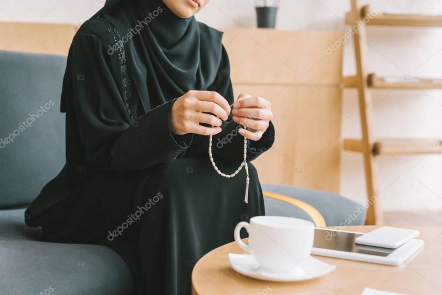 muslim woman with prayer beads
