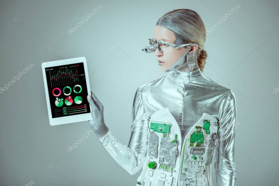silver robot looking at tablet with transport appliance isolated on grey, future technology concept