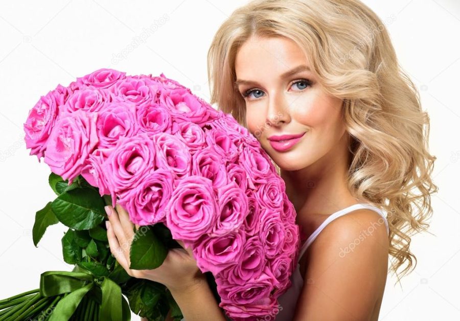 Woman with a bouquet of roses