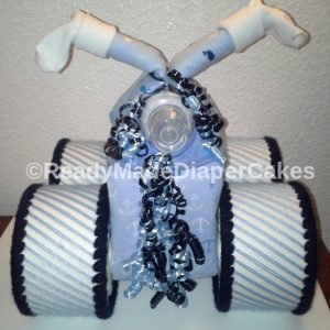 Navy Blue Light Blue and White Themed Baby Shower Four Wheeler Diaper Cake Table