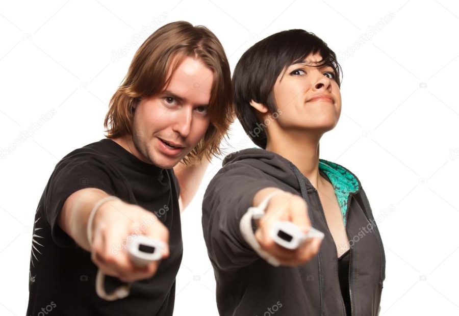 Mixed Race Couple Playing Video Game Remotes on White