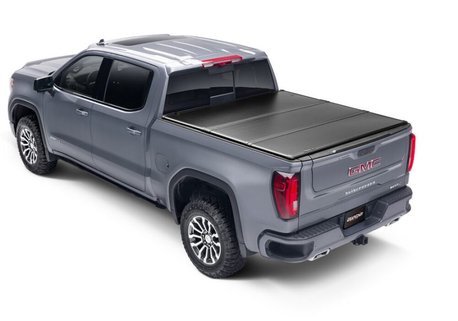 UNDERCOVER TR56011 Triad Hard Folding Truck Bed Tonneau Cover | | Fits 2005 - 2021 Nissan Frontier w/track system 4FT 11 INCH Bed (58.6 INCH)