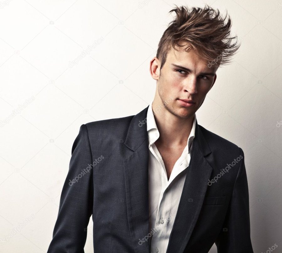 Elegant young handsome man. Studio fashion portrait.