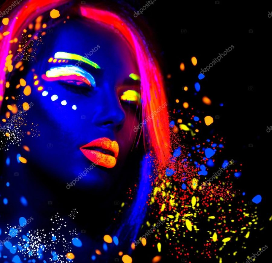 Fashion model woman in neon light