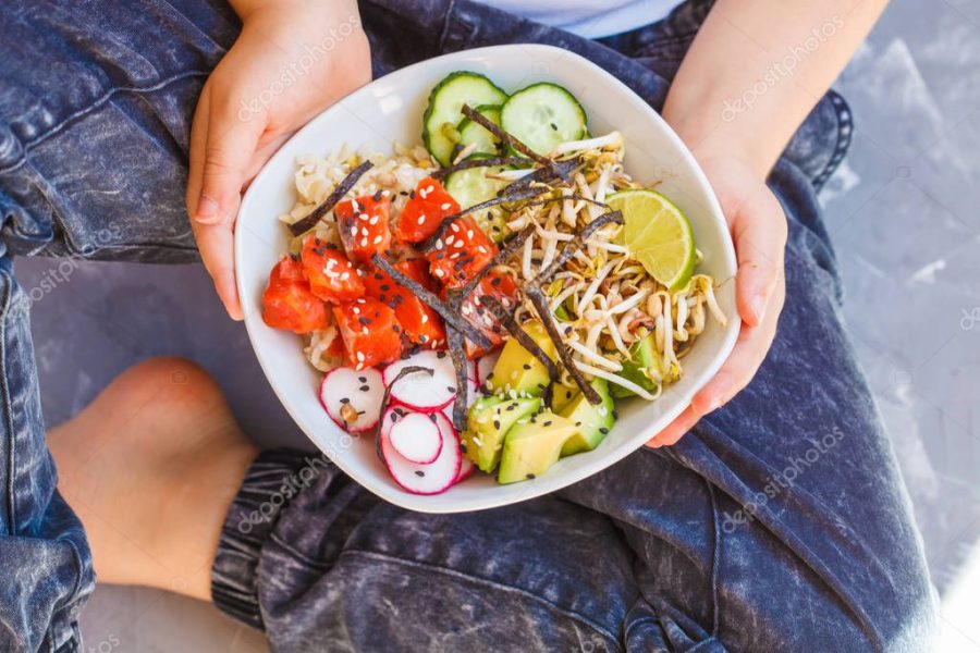 Hawaiian Ahi Poke dish with fish, rice and vegetables