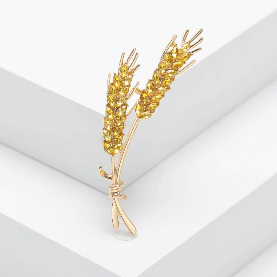 Two Gold-Toned Straws Brooch With Simulated Gemstones