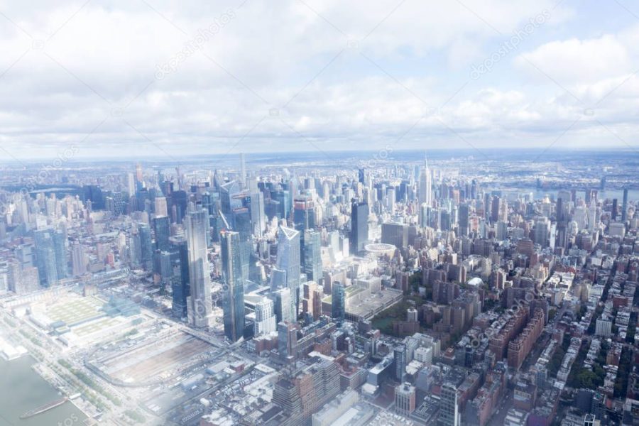 aerial view of new york city skyscrapers and cloudy sky, usa