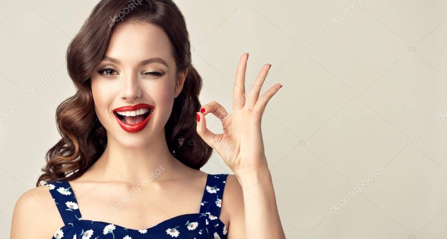 beautiful woman with red manicure