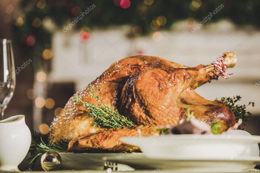 Roasted turkey on holiday table