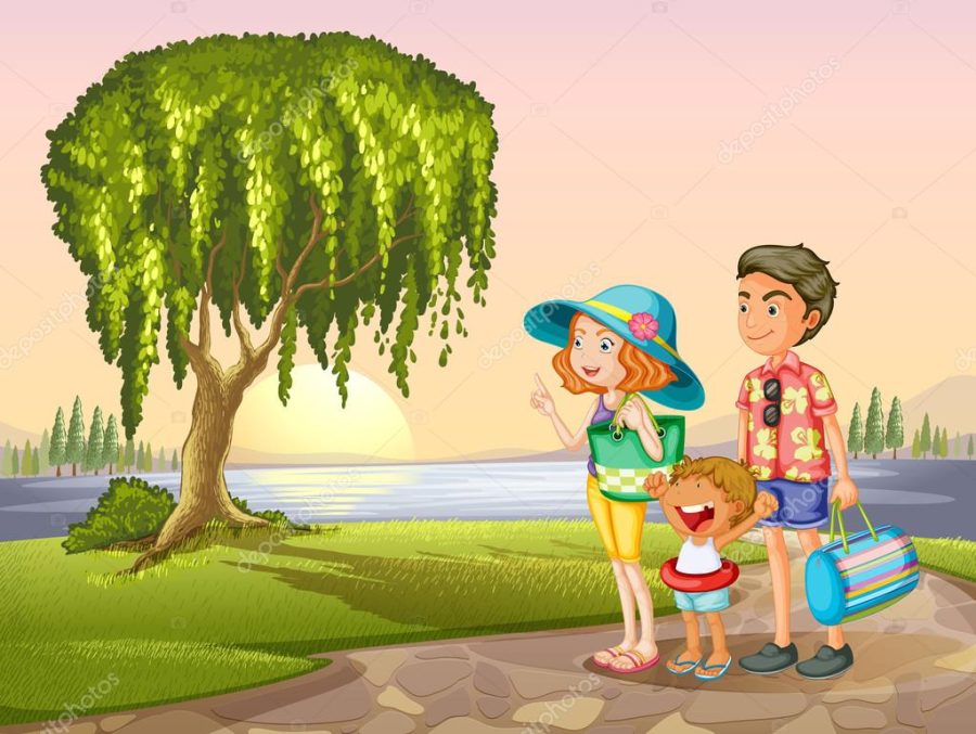 man, woman and kid standing around tree