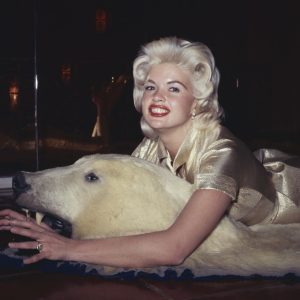 Jayne Mansfield in gold dress lying on bear skin rug 11x14 Photo