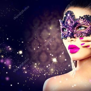 Sexy woman wearing carnival mask