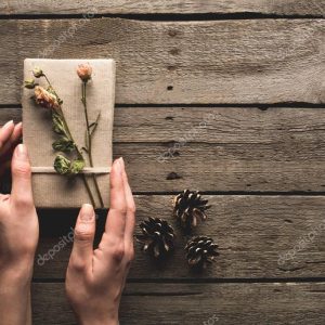 woman holding christmas gift