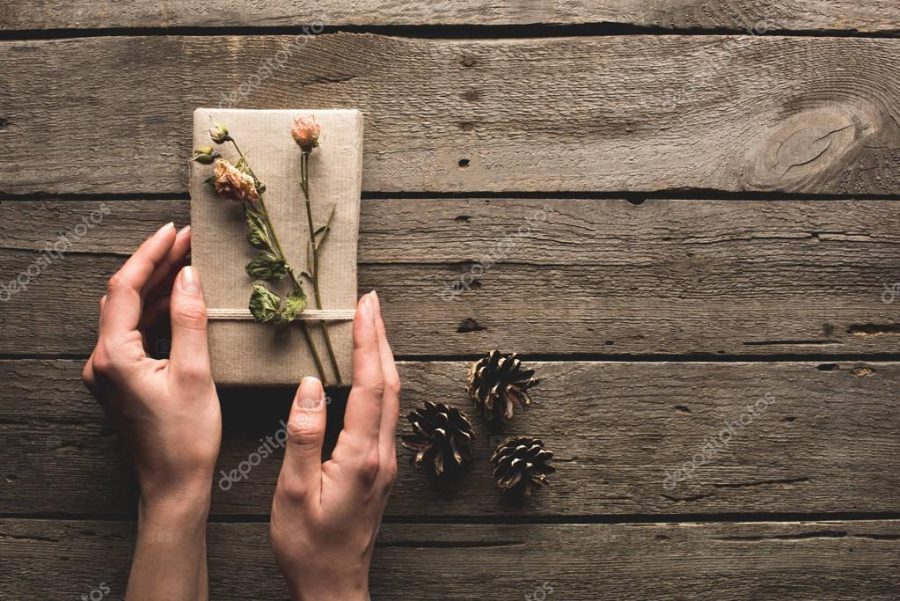 woman holding christmas gift