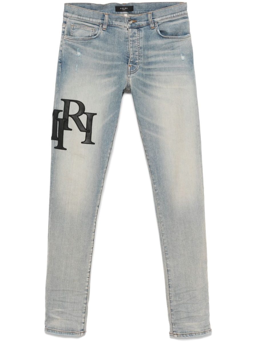 AMIRI Staggered Logo Skinny Jeans Antique