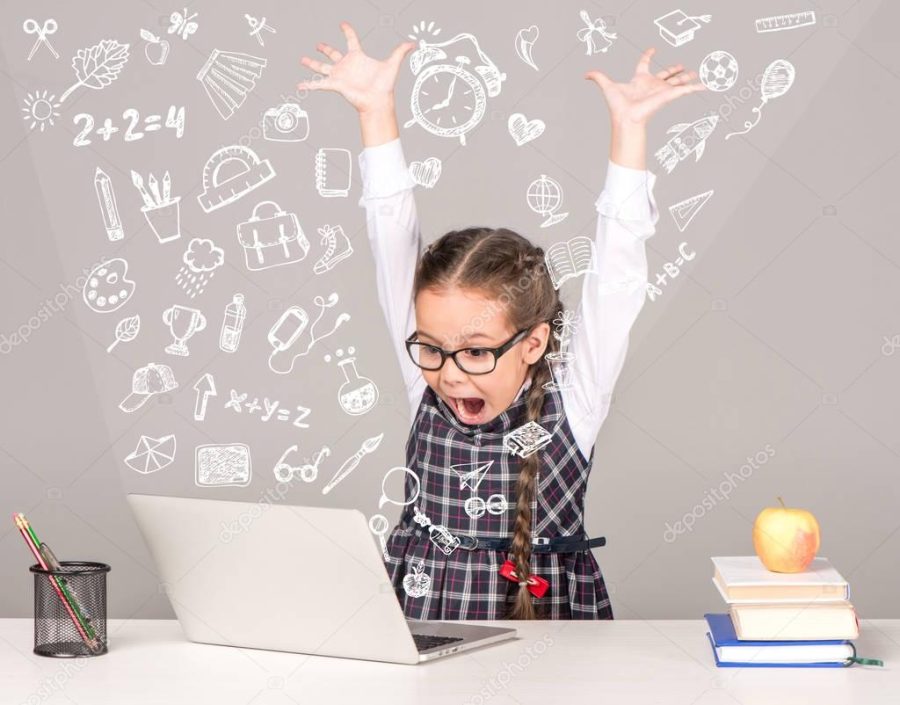 excited schoolgirl with laptop