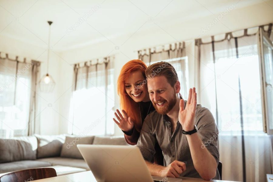 Couple making a video call online on the internet.