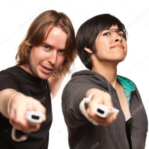 Mixed Race Couple Playing Video Game Remotes on White