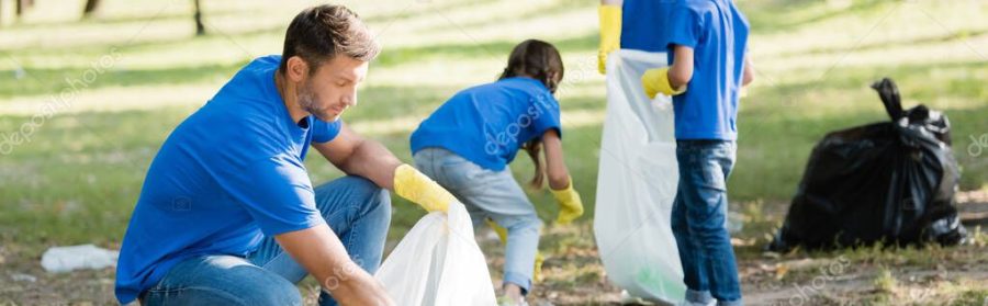 family of volunteers collecting rubbish in recycled plastic bags, ecology concept, banner