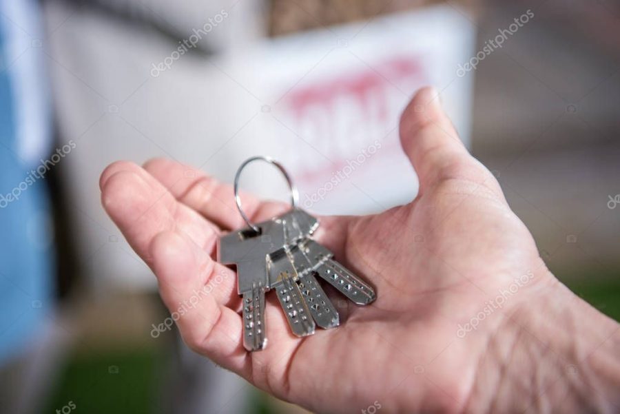 saleman holding keys