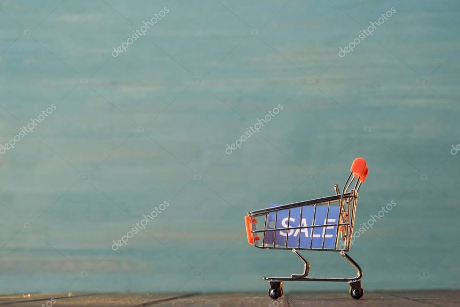 small shopping cart with sale sign