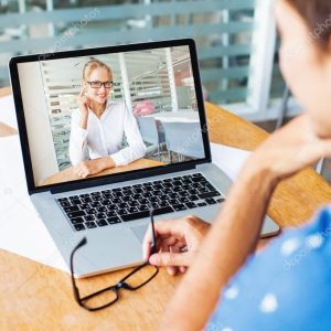 woman and man talking on web camera