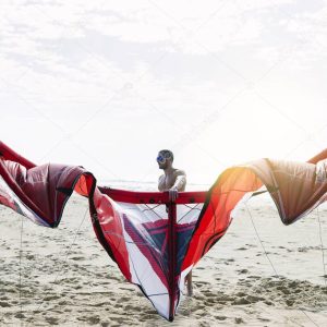 Portrait of handsome man kitesurfer.
