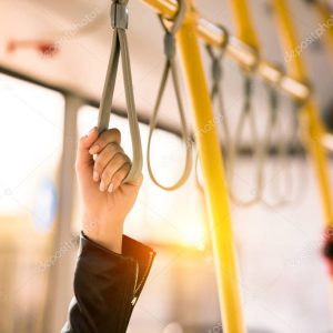 person standing in bus